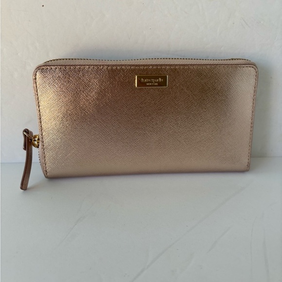 Kate Spade  NWOT Rose Gold Zip Around Leather Wallet - Picture 1 of 9